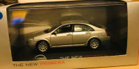 14323 Nissan Primera, Silber. 1:43
